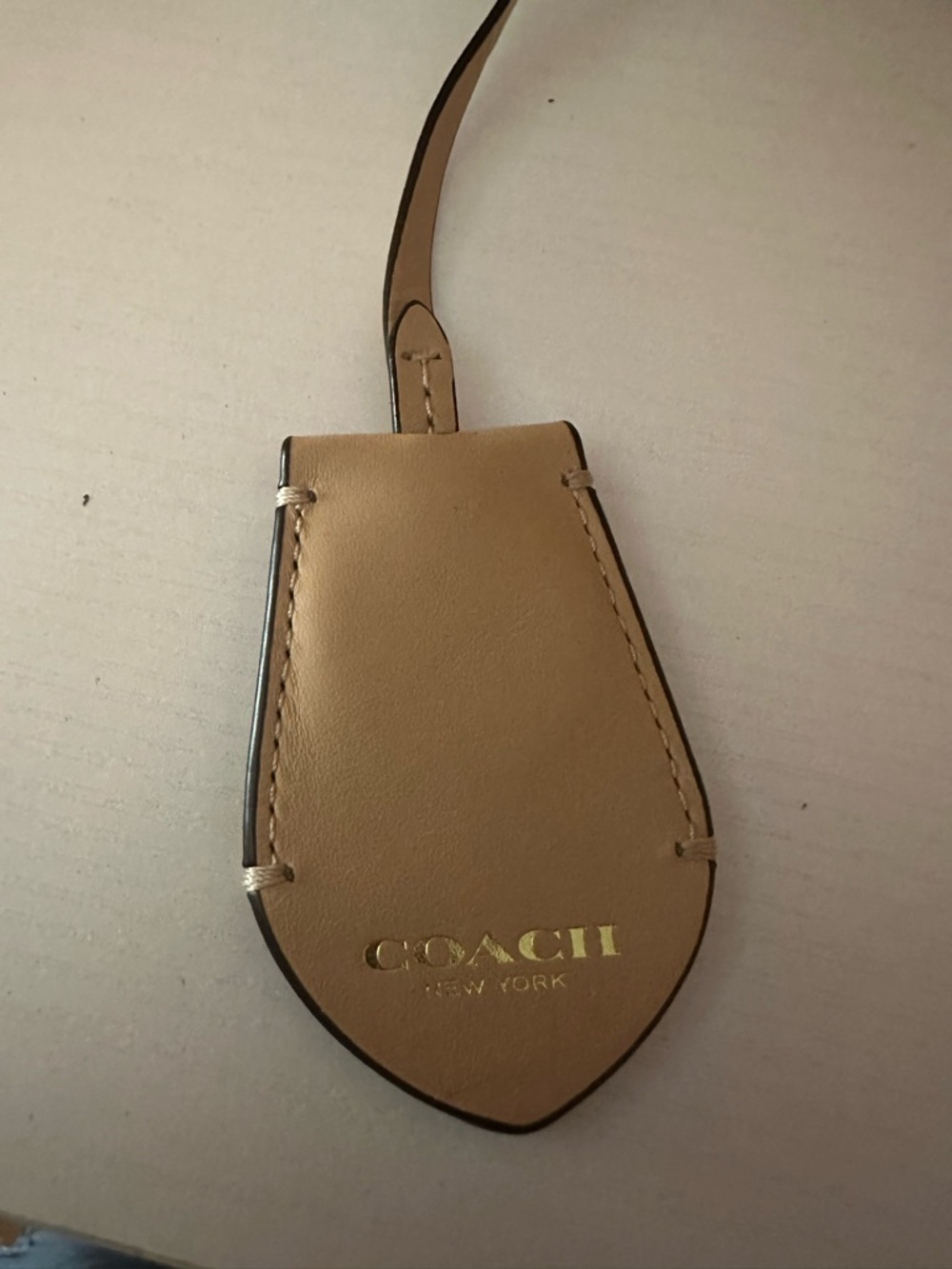 COACH Tan Leather Bag Tag with Gold Logo